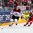 PRAGUE, CZECH REPUBLIC - MAY 9: Latvia's Kristaps Sotnieks #11 skates with the puck while Austria's Brian Lebler #7 chases him down during preliminary round action at the 2015 IIHF Ice Hockey World Championship. (Photo by Andre Ringuette/HHOF-IIHF Images)

